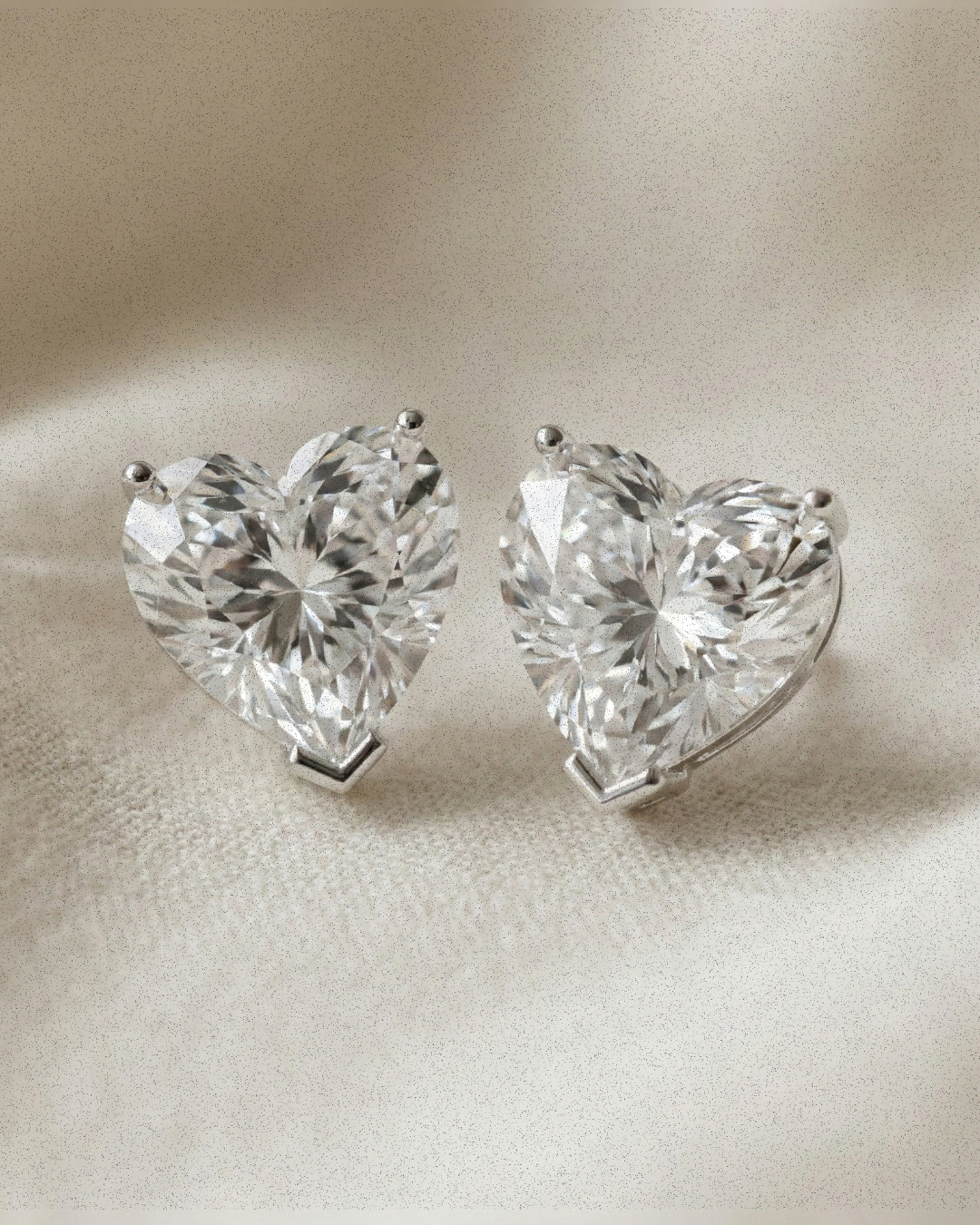 Éclat Heart Studs - Sterling Silver Rhodium Plated Moissanite Heart Studs - Suramyah