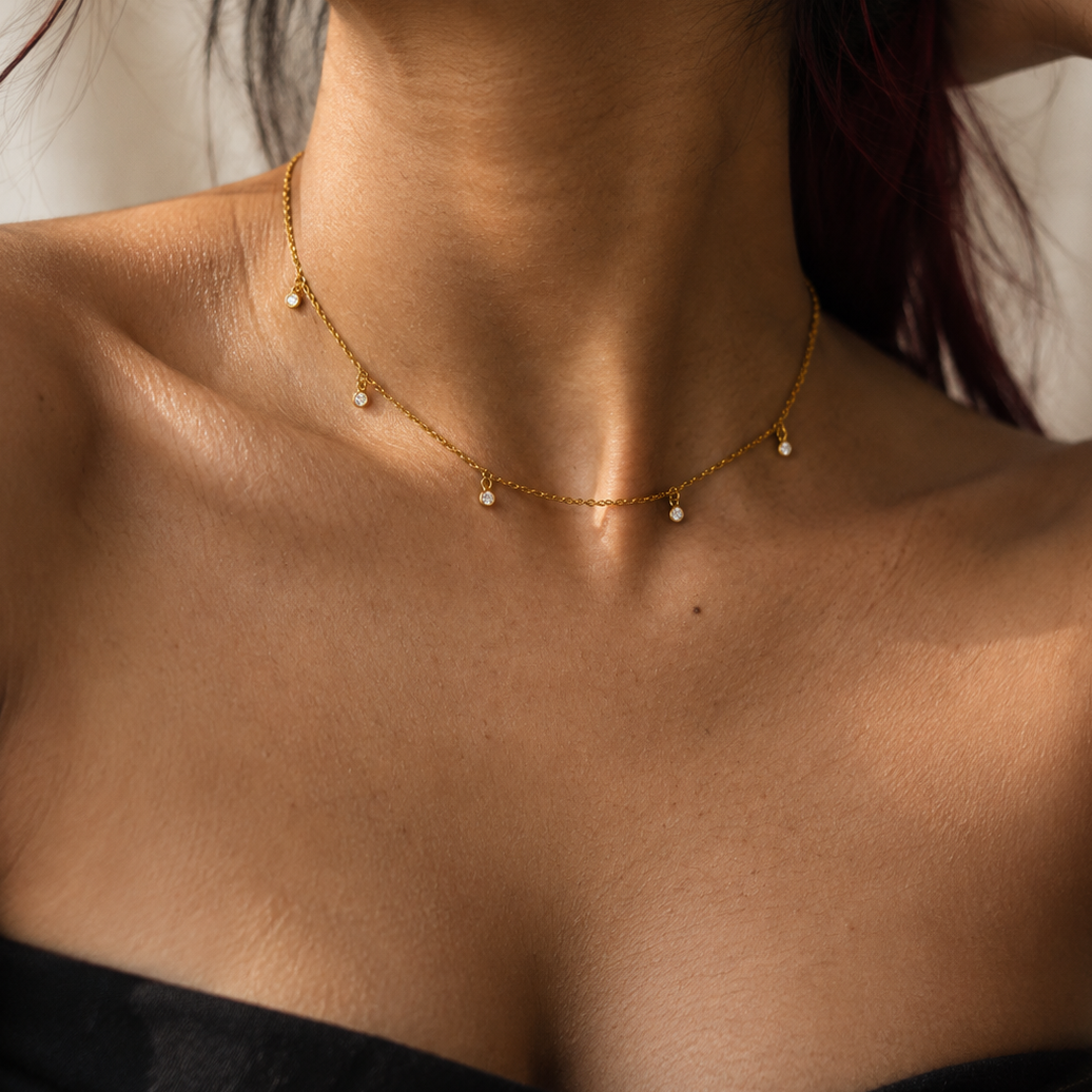 5 diamond charm necklace in silver and gold