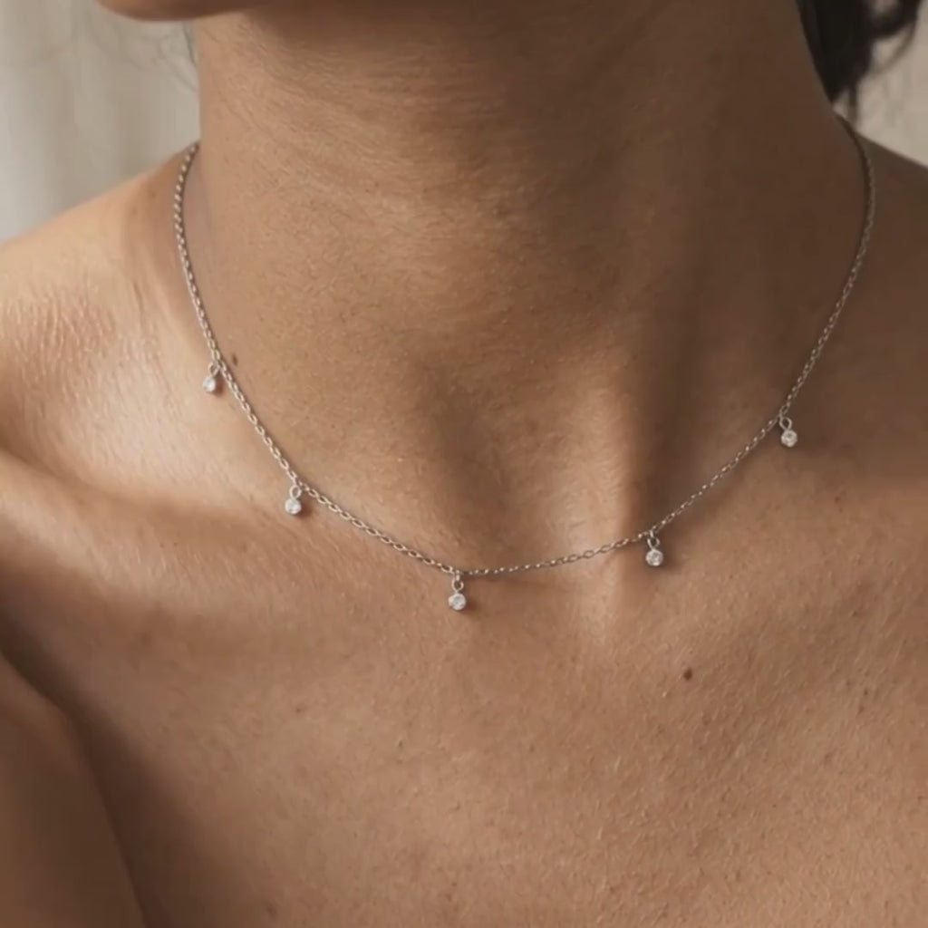 5 diamond charm necklace in silver and gold